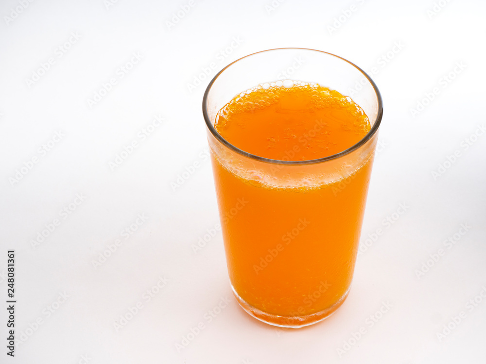 Glass of orange juice on white Glass of orange juice on white