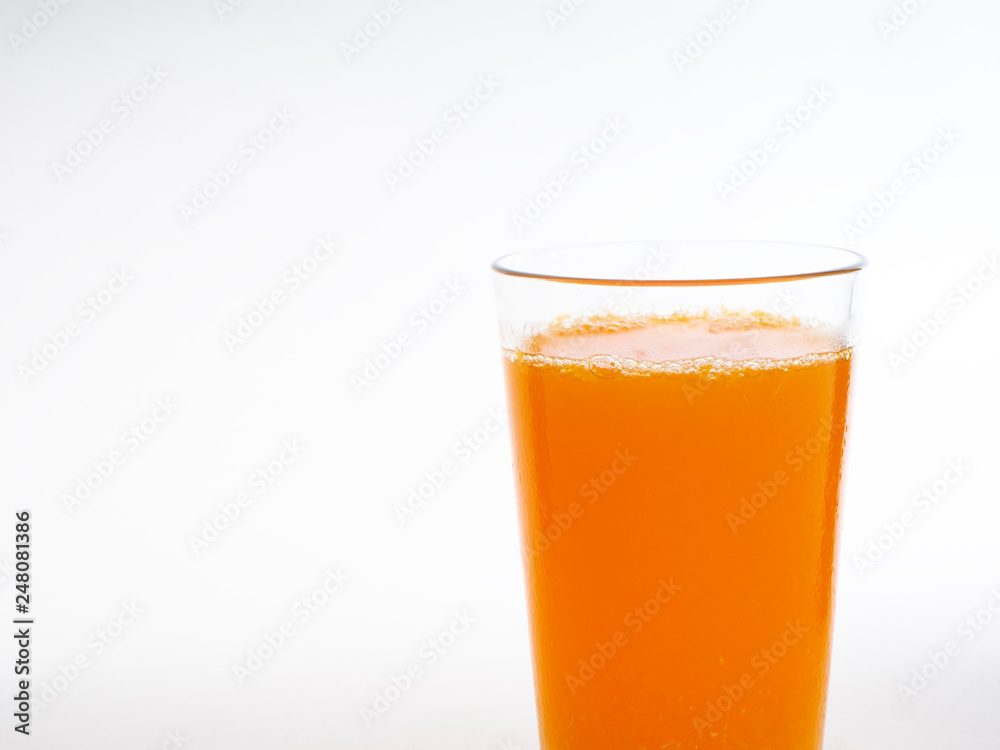 Glass of orange juice on white Glass of orange juice on white