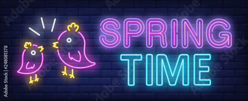 Spring time neon text with twitting birds