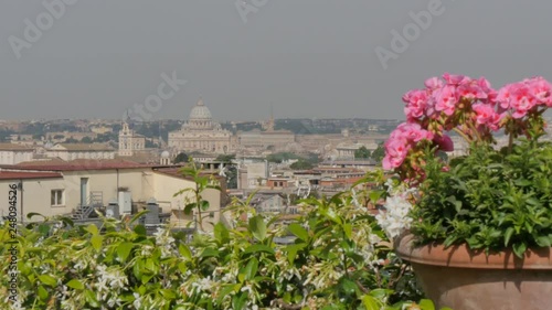 View of St PeterA�€™s Cathedral and rooftops of Rome, Rome, Lazio, Italy, Europe photo