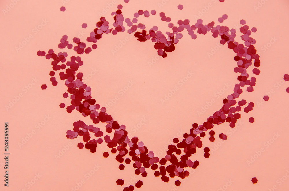 red glitter hearts on a white background for Valentine's Day