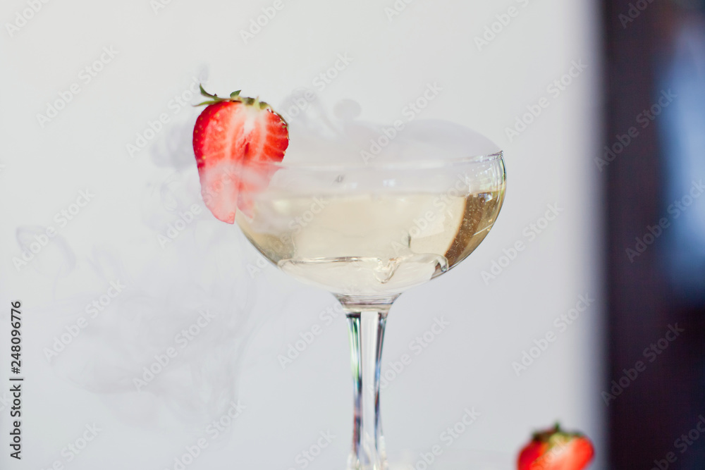 Several glasses of cocktail with strawberry Several glasses of cocktail with strawberry