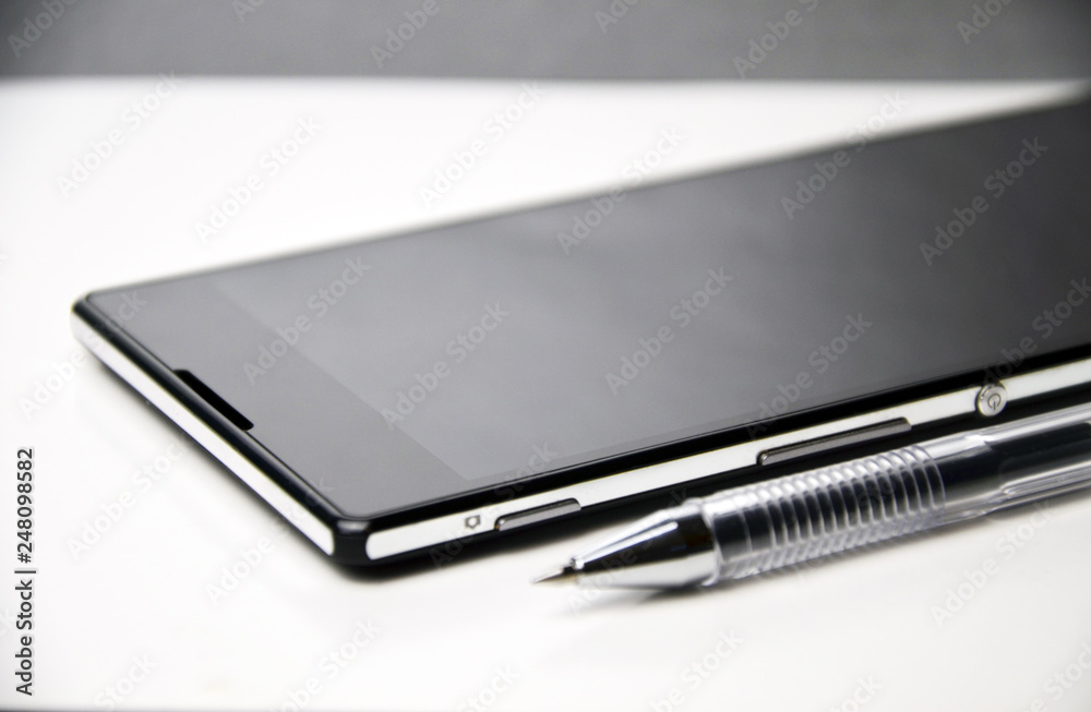 A pen and a phone A pen and a phone