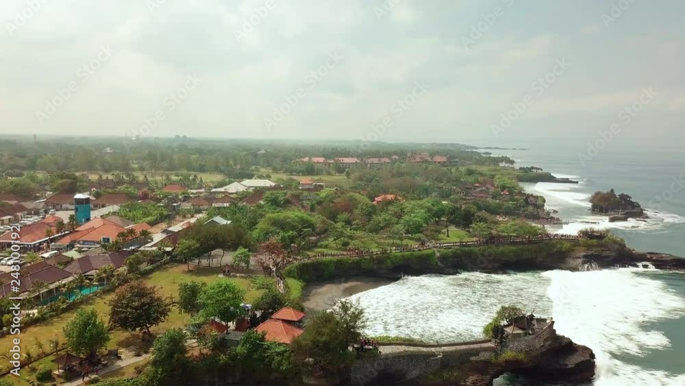 Tanah Lot Temple aerial view in the Ocean. Bali, Indonesia