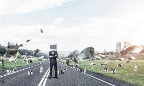 Businessman with monitor instead of head.