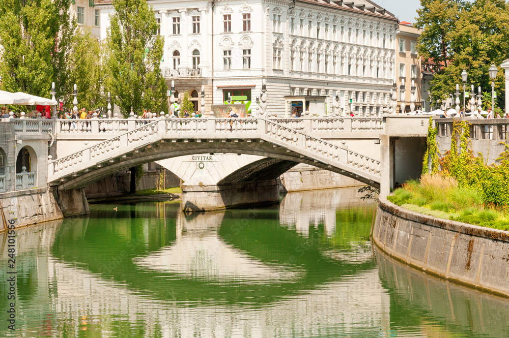 Close up of famous Triple bridge (Tromostovje) above Ljubljanica river in the center of Ljubljana, Slovenia