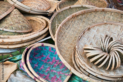 Wicker Straw Plate Pile on Local Oriental Market photo