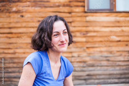 Portrait of a smiling brunette.