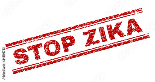 STOP ZIKA seal print with corroded effect. Red vector rubber print of STOP ZIKA tag with dirty texture. Text tag is placed between double parallel lines.