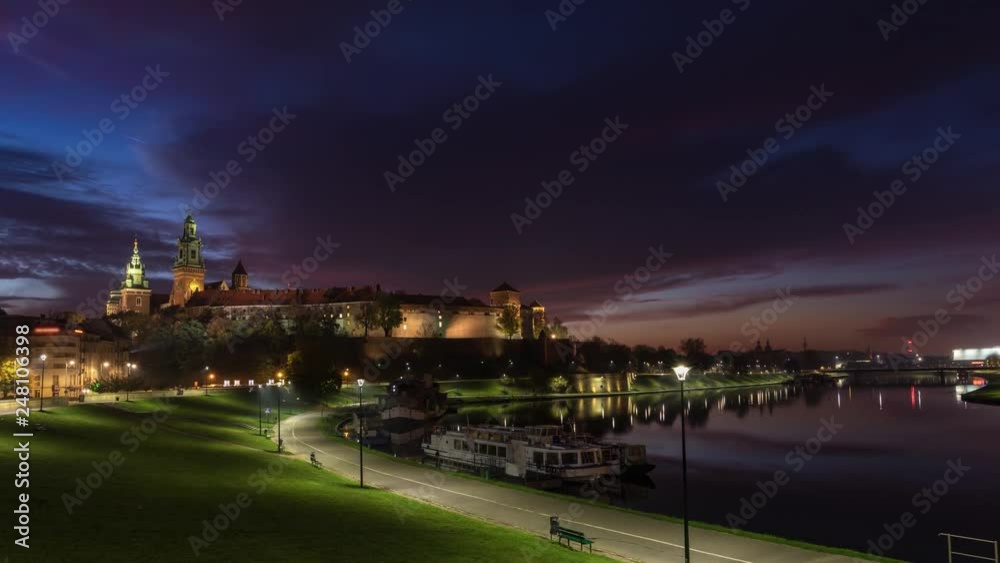 Wawel Castle in Krakow by blue hour, Poland - 4k UHD time lapse zoom in shot) Wawel Castle in Krakow by blue hour, Poland - 4k UHD time lapse zoom in shot)