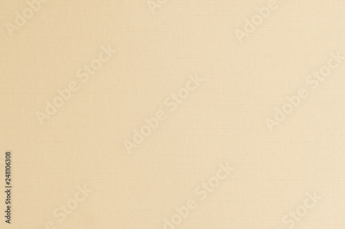 Cotton silk blended fabric texture background in yellow gold brown color