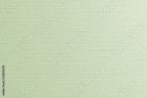 Cotton linen woven fabric texture background in light pale lime green color