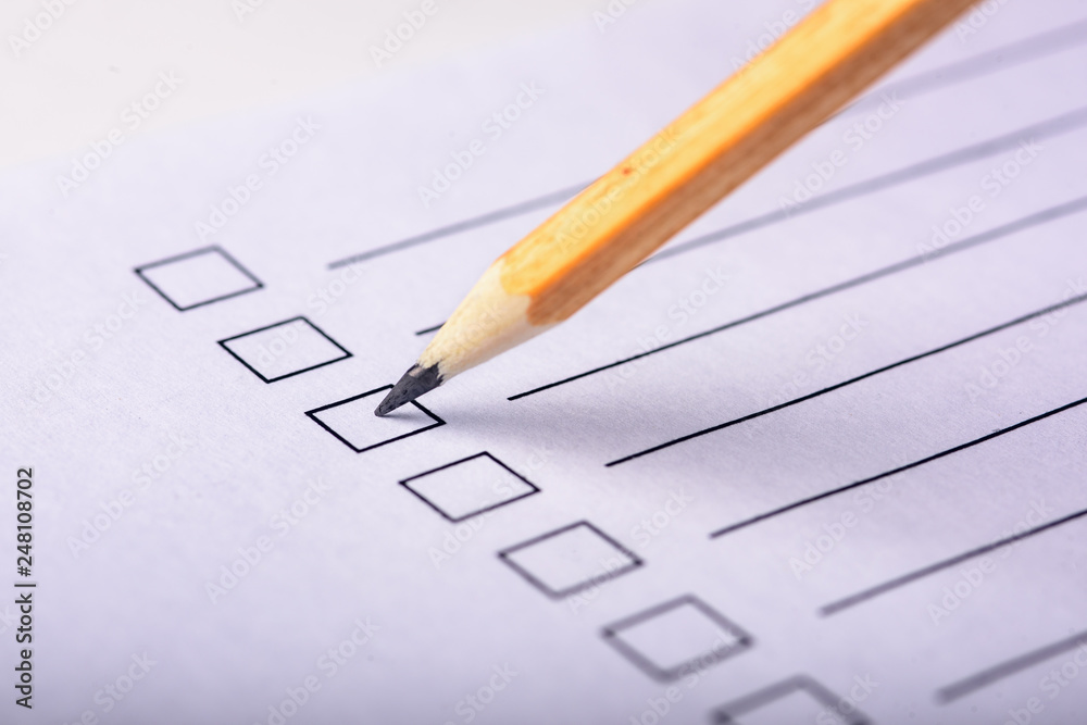 pencil on the questionnaire pencil on the questionnaire