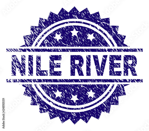 NILE RIVER stamp seal watermark with distress style. Blue vector rubber print of NILE RIVER text with scratched texture.