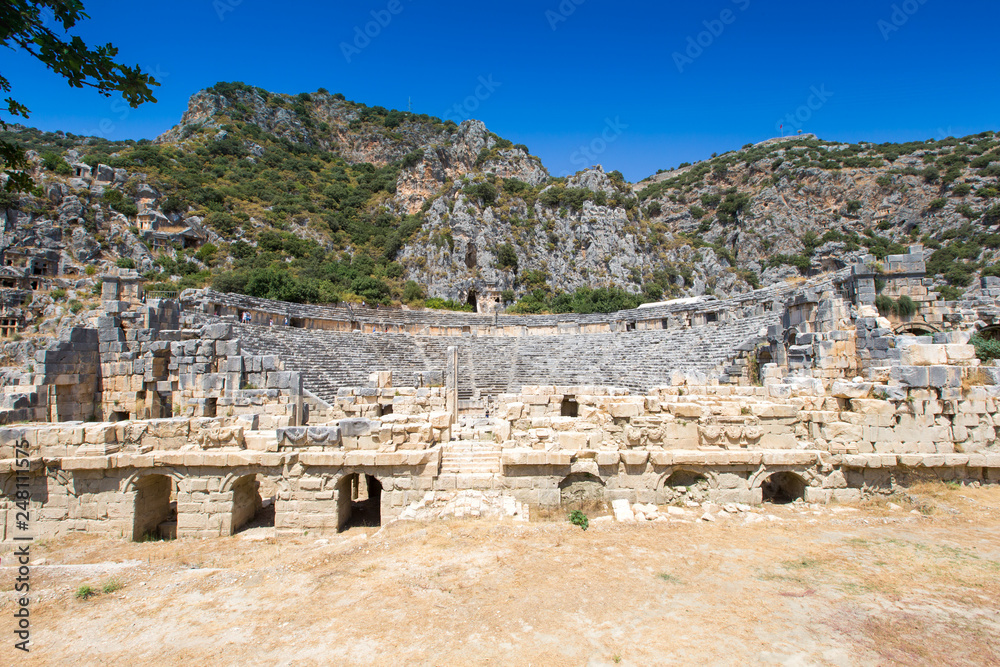 Ancient lycian necropolis with tomb carved in rocks in Mira