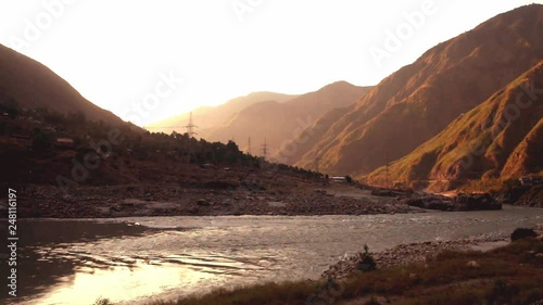 Sunrise in Besham with a view of mountains and flowing Indus river. Khyber-Pakhtunkhwa. Pakistan. photo