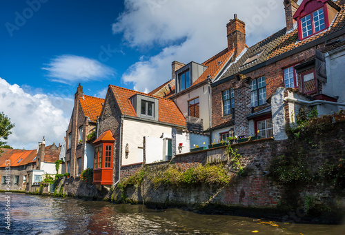 Beautiful canal and traditional houses in the old town of Bruges (Brugge), Belgium © Sergey Kelin