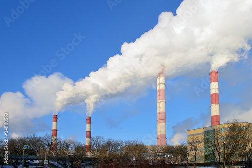 Stream of smoke from the chimney of a factory