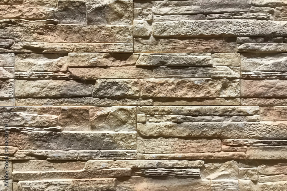 Old Brown Stone brick wall Pattern background. Interior decor and design texture