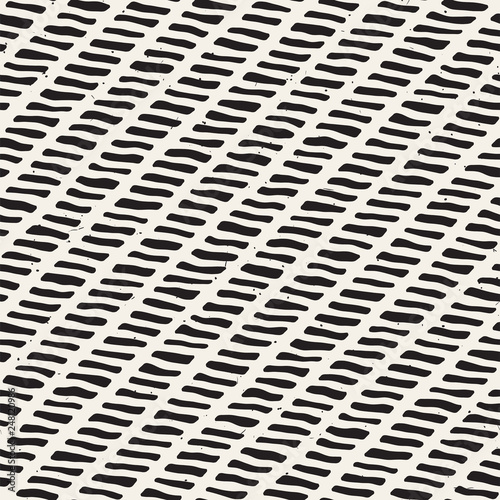Seamless ink geometric vector pattern. Monochrome black and white slanted brush strokes background. Hand draw diagonal dash lines.