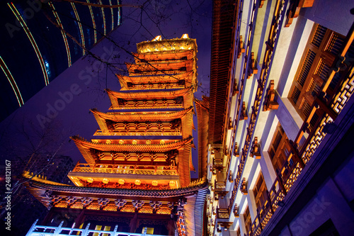 A stately Buddhist temple, Jing’an Temple is located in Jing’an District, Shanghai. It is a famous tourist attraction and a splendid stupa. photo