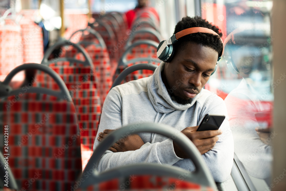 © Rawpixel.com - Man riding the bus alone
