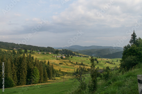 View of the Ukrainian village and the mountains. The mountain environment. © Олег Дашковець