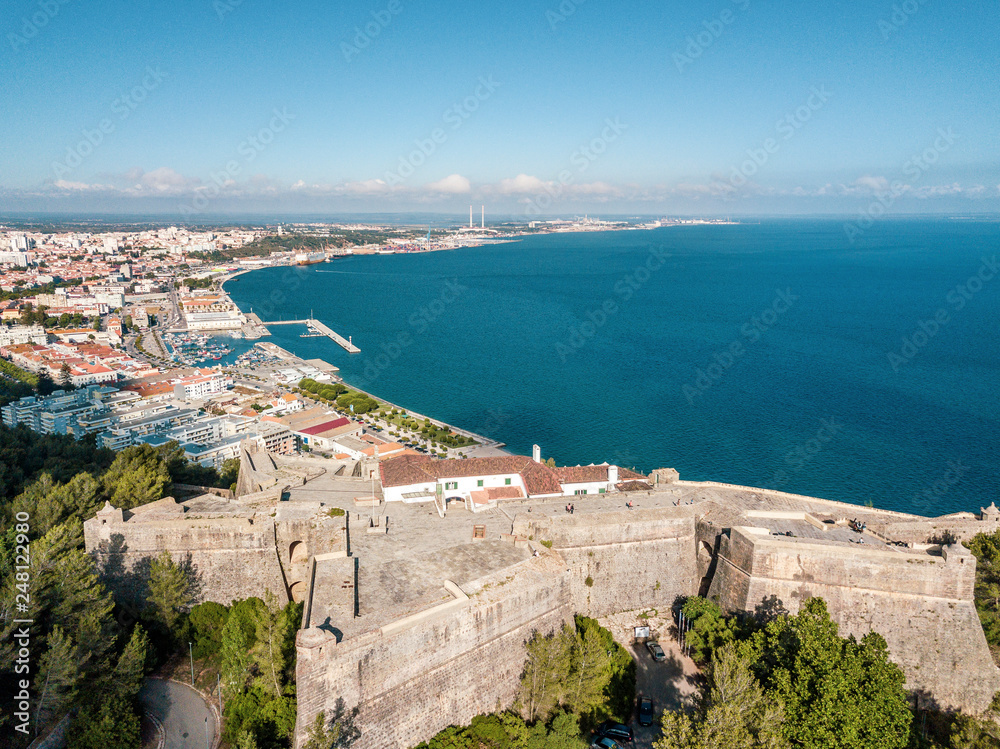 Aerial view of Setubal with fortress in the forest, Portugal