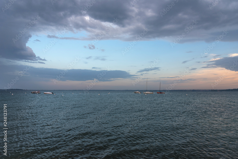 A beautiful sunset over the lake Garda.Italy. A beautiful sunset over the lake Garda.Italy.