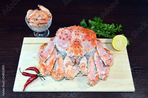  Frozen king crab on a cutting board
