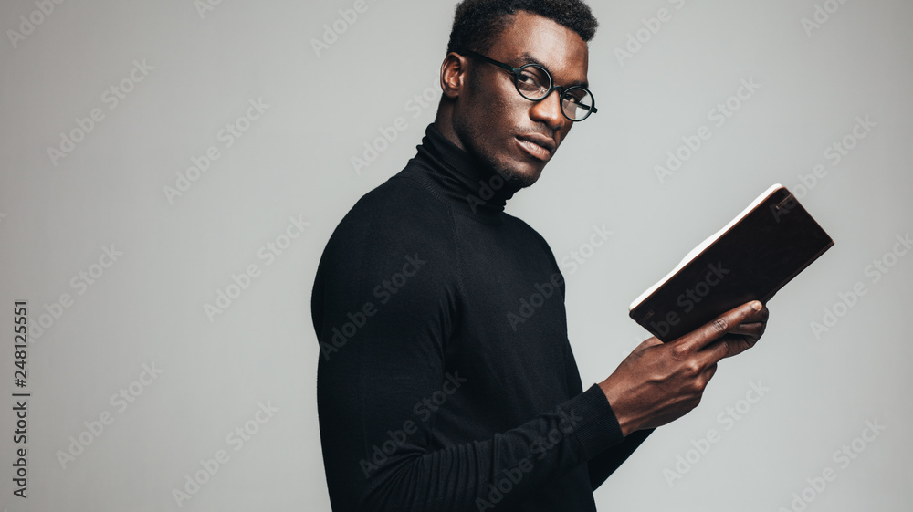 Smart young man with a book Smart young man with a book