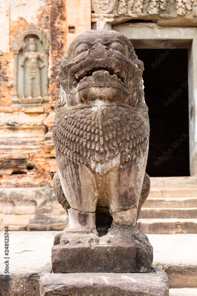 guardian sculpture protecting the entrance to a shrine of Preah Ko temple, Siem Reap, Cambodia, Asia