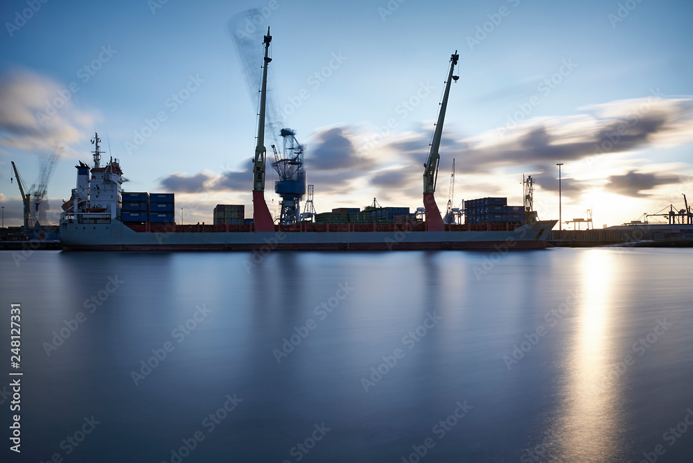 Cranes at work loading and unloading ships at the Port of Rotterdam