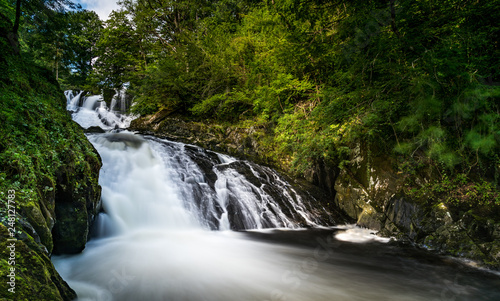 Fototapeta Naklejka Na Ścianę i Meble -  Beautiful waterfall located in Snowdonia National Park, Gwynedd, Wales, UK