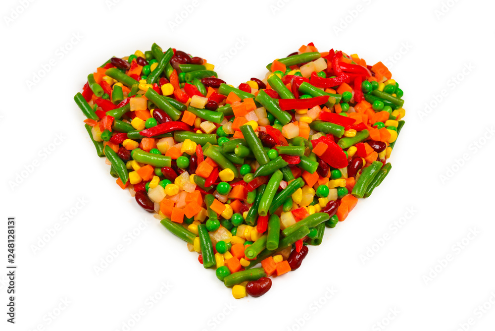 Heart made of vegetables. Corn, carrot, bell pepper, green beans. Isolated on white. Heart made of vegetables. Corn, carrot, bell pepper, green beans. Isolated on white.