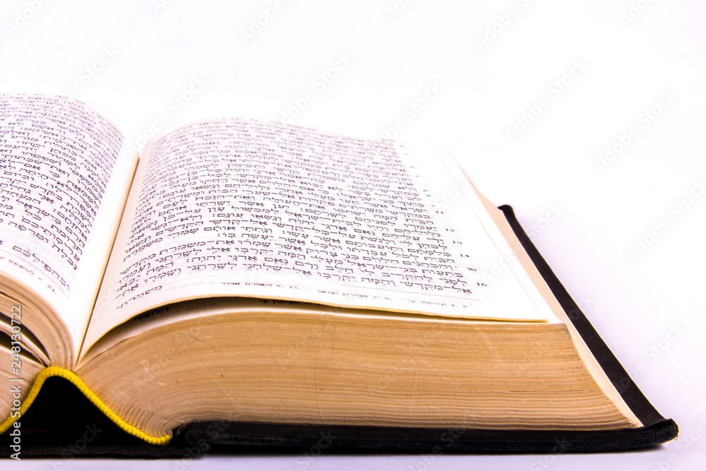 Opened hebrew Bible, isolated on white background Opened hebrew Bible, isolated on white background