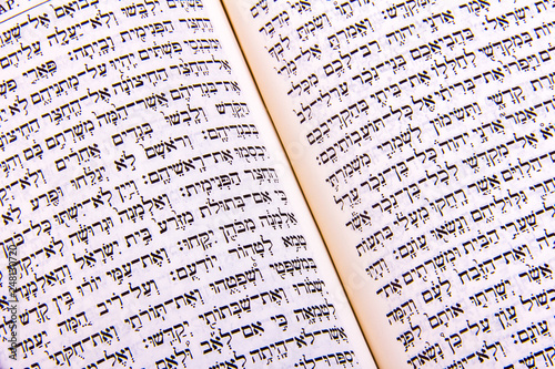 Opened hebrew Bible, isolated on white background photo