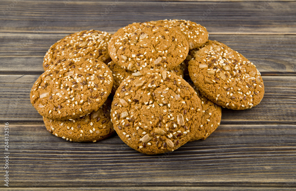 cookies with seeds on a wooden background