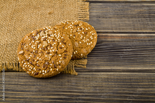 cookies with seeds on a wooden background