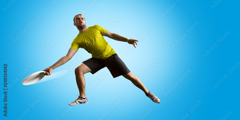 Fototapeta premium Sportsman play ultimate frisbee. One athlete give passes, isolated in coulur background