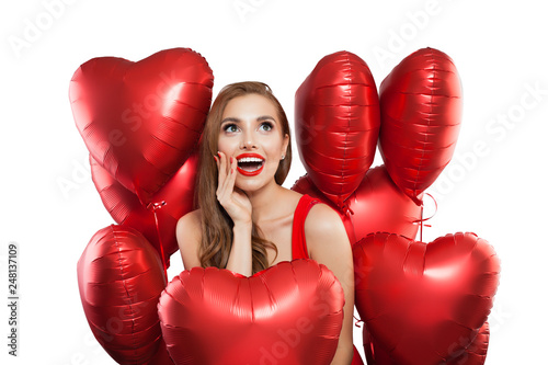 Surprised woman with red balloonsisolated on white background photo