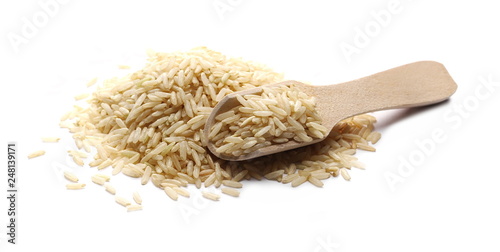 Integral long rice pile in wooden spoon isolated on white background