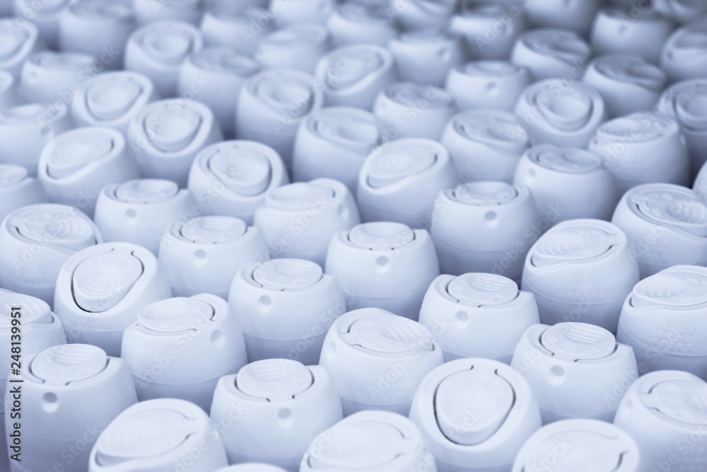 Obraz premium close up of deodorant plastic caps in supermarket