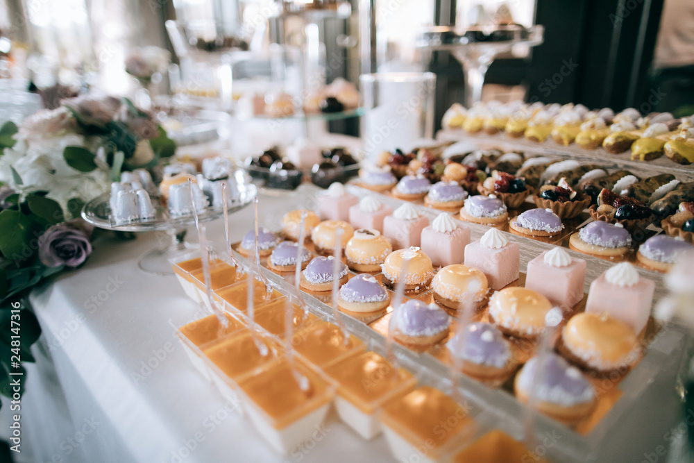  Delicious wedding desserts on the table, catering service
