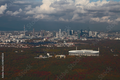 Forest area, stadium and city, aerial photograph. Frankfurt am Main, Germany