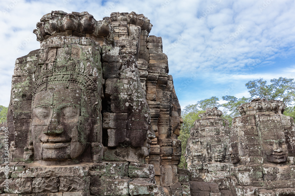 faces on the towers of Angkor Thom temple, Siem Reap, Cambodia, Asia