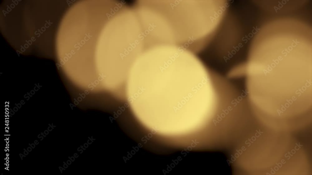 gold yellow bokeh particles background