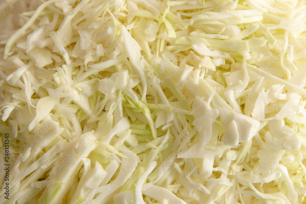 Sliced cabbage on the table as background Sliced cabbage on the table as background