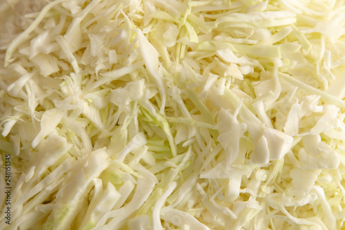 Sliced cabbage on the table as background