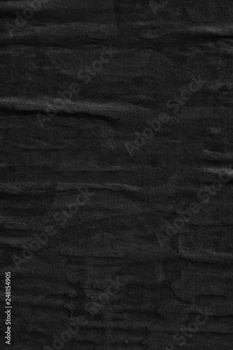 Dark black paper background creased crumpled posters old torn ripped surface grunge textures placard backdrop empty space for text